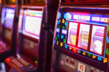 Card game lobby showing multiple live tables with real-time player counts